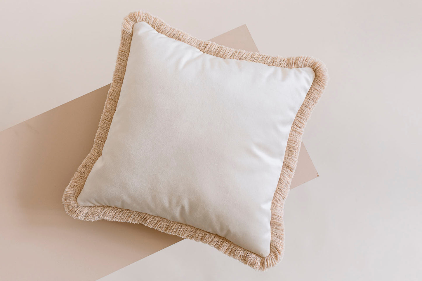 pearl velvet cushion on a floor