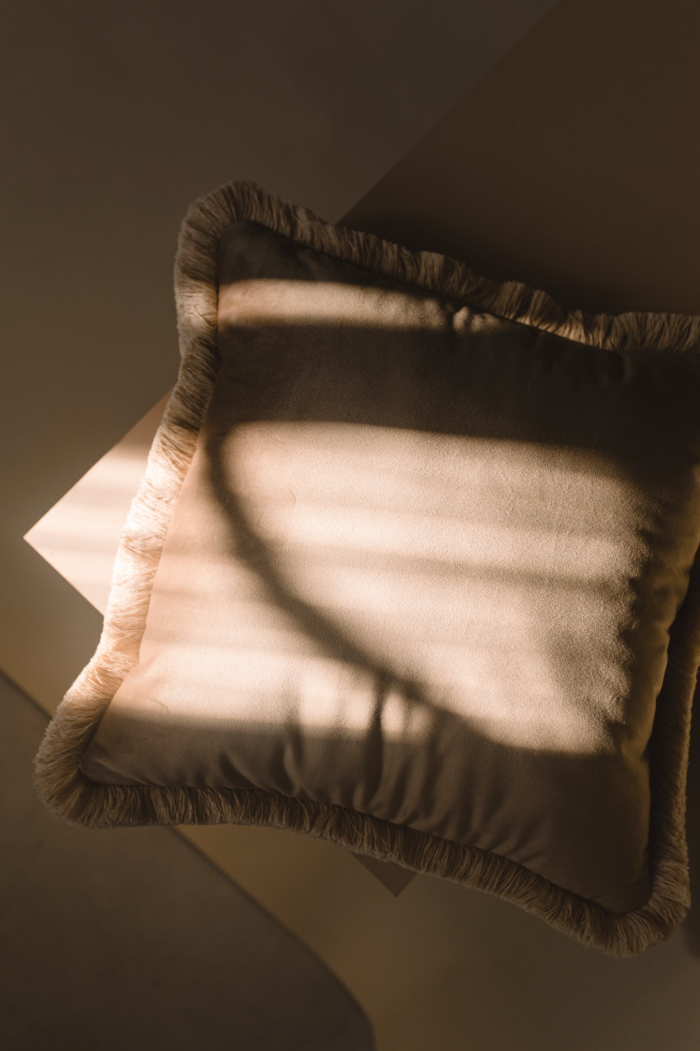 brown square cushion in the sun